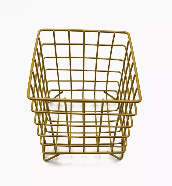 An empty golden wire basket An empty golden wire basket