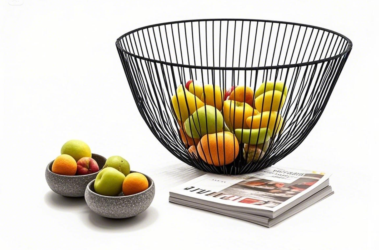 Black wire basket with fruits and bowls.