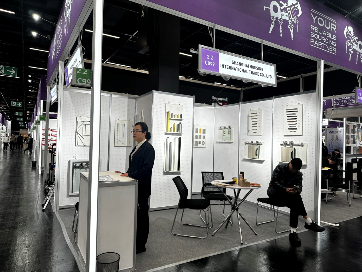 Shanghai Housing booth at EISENWARENMESSE 2026 Cologne displaying furniture hardware and barn door hardware.png